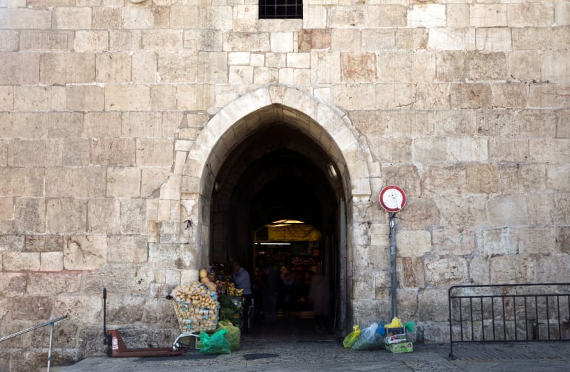 Vegetables for sale are seen near Herod's Gate in Jerusalem's Old City October 7, 2019 (photo credit: REUTERS/NIR ELIAS)