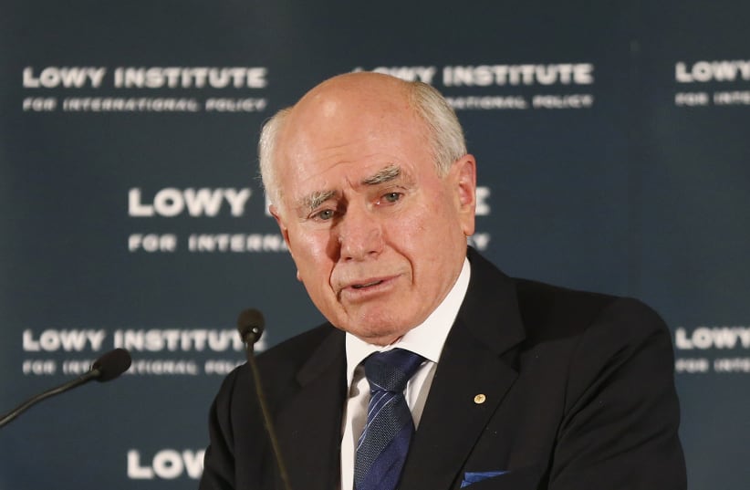 Former Australian Prime Minister John Howard gives a speech entitled "Iraq 2003: A Retrospective" in Sydney April 9, 2013. Howard gave the speech to mark the 10th anniversary of the fall of Baghdad to US forces. (photo credit: DANIEL MUNOZ / REUTERS)