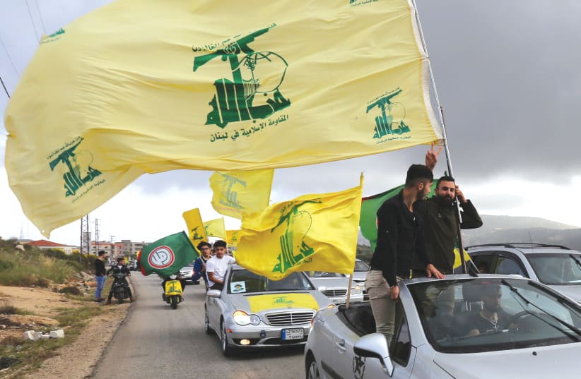 Iran's proxies, including Hezbollah, are empowered throughout the Middle East  (photo credit: REUTERS)