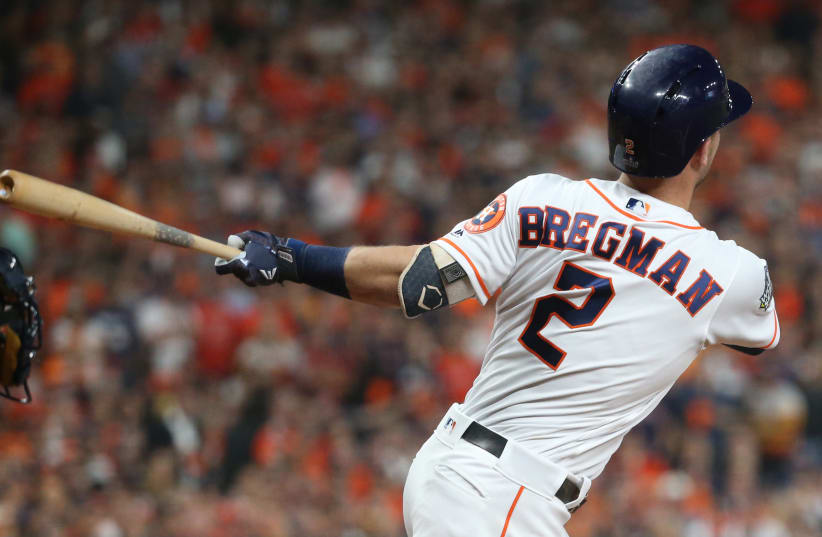Oct 29, 2019; Houston, TX, USA; Houston Astros third baseman Alex Bregman (2) hits a solo home run against the Washington Nationals in the first inning in game six of the 2019 World Series at Minute Maid Park (photo credit: TROY TAORMINA-USA TODAY SPORTS)