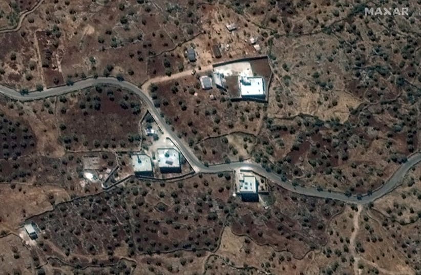 A satellite view of the reported residence of ISIS leader, Abu Bakr al-Baghdadi, according to the source, near the village of Barisha, Syria (photo credit: REUTERS)