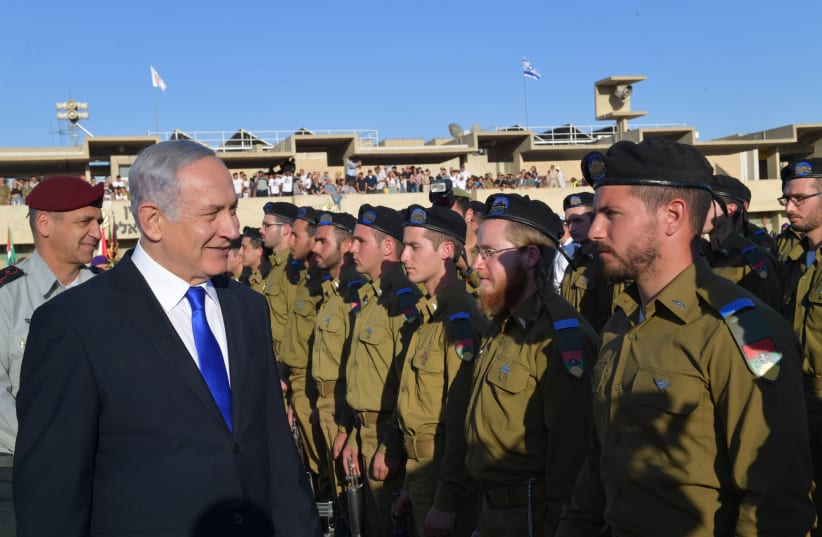 Prime Minister Benjamin Netanyahu at a ceremony for new IDF officers (photo credit: KOBI GIDEON/GPO)