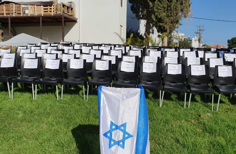 Chairs set up by young residents of Sderot to represent the 120 MKs who they feel abandoned them as rockets continue to be fired from Gaza. (photo credit: Courtesy)