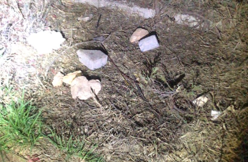 Rocks thrown at border police patrol near Yitzhar settlement on November 4, 2019. (photo credit: BORDER POLICE)