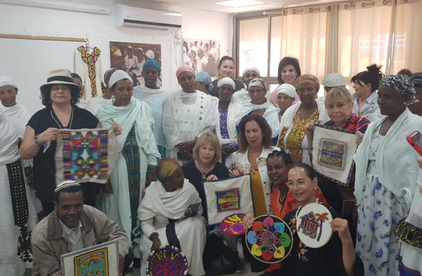 Members of the philanthropic women’s foundation Lion of Judah Israel meet with representatives of 56 families from Ethiopia who immigrated a year or less than a year ago. (photo credit: LION OF JUDAH FOUNDATION)