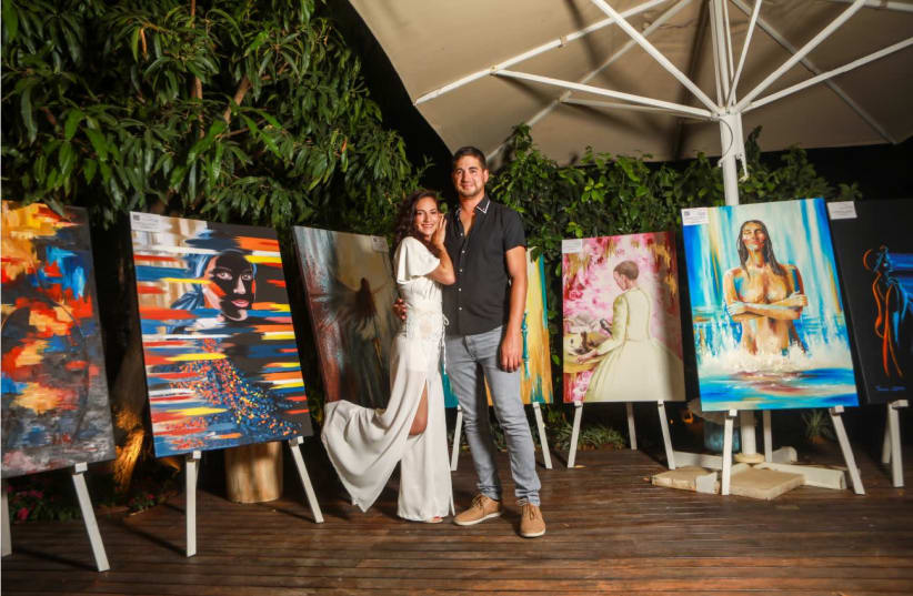 THEN AND now: Tzachi and Tamar Zeitlin. The couple makes a living via lectures and Tamar’s paintings (photo credit: SHLOMI YOSEF)