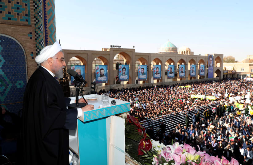 Iranian President Hassan Rouhani addresses the crowd of people in Yazd, Iran (photo credit: REUTERS)