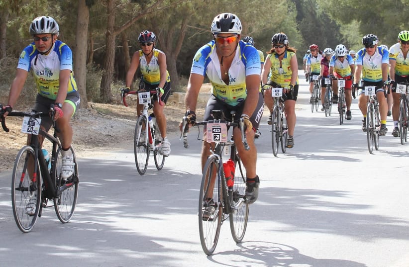 Bike riders participating in the "Wheels of Love" charity ride across Israel (photo credit: WHEELS OF LOVE)