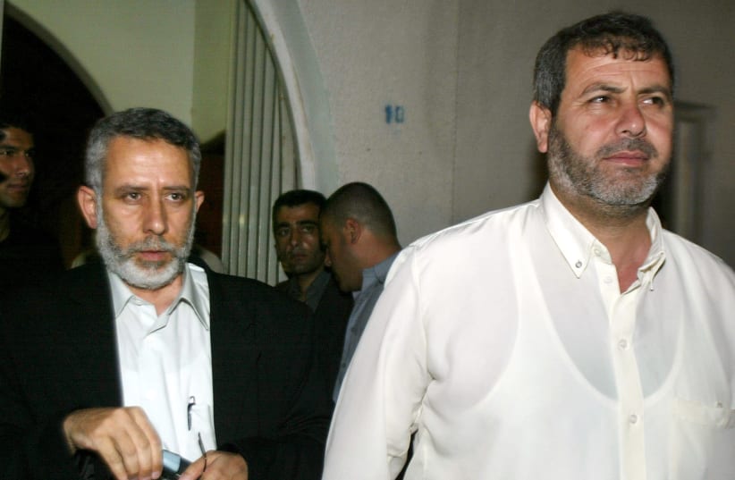 TOP ISLAMIC JIHAD OFFICIAL MOHAMMED AL-HINDI AND KHALED AL-BATSH LEAVE AFTER MEETING IN GAZA. (photo credit: REUTERS)
