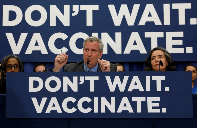 NY city mayor declares a public health emergency in parts of Brooklyn in response to measles outbreak in the orthodox jewish community of Williamsburg in April (photo credit: REUTERS)