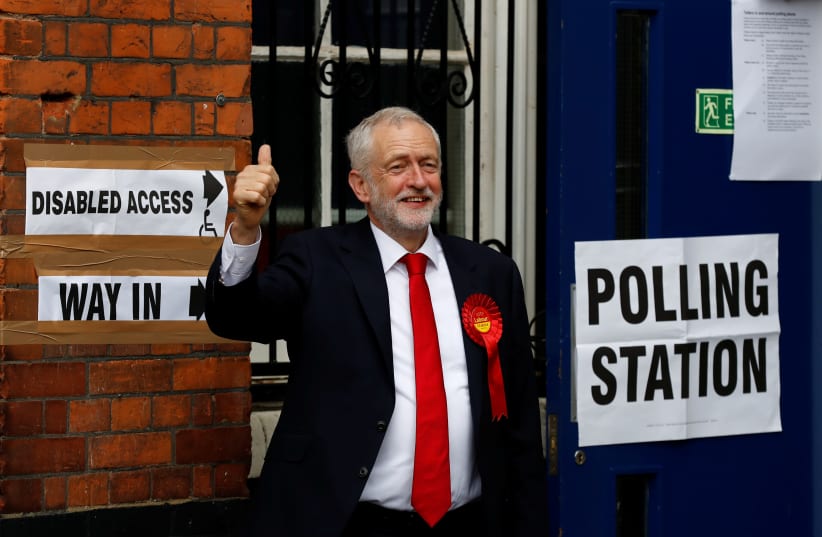 Jeremy Corbyn, leader of Britain's opposition Labour Party, arrives to vote in Islington, London, Britain June 8, 2017 (photo credit: STEFAN WERMUTH/REUTERS)