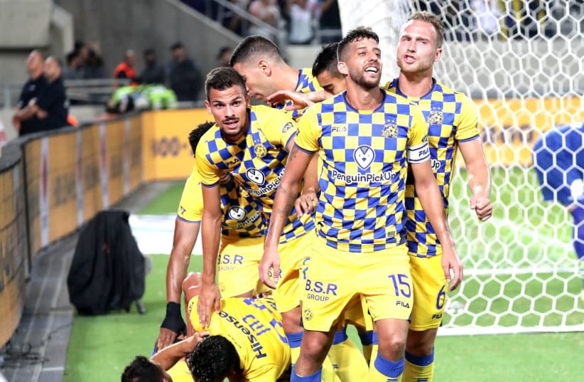 DEFENDING CHAMPION Maccabi Tel Aviv has not lost a beat, sitting atop the Israel Premier League standings a quarter of the way throught the season (photo credit: DANNY MARON)