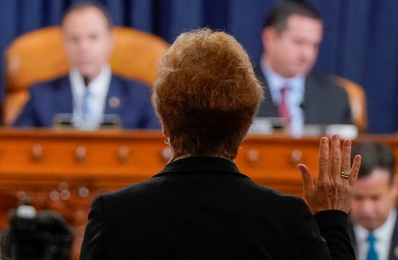 Marie Yovanovitch, former U.S. ambassador to Ukraine, is sworn in before a House Intelligence Committee hearing as part of the impeachment inquiry into U.S. President Donald Trump on Capitol Hill in Washington, U.S., November 15, 2019. (photo credit: JOSHUA ROBERTS/REUTERS/POOL/ABACA PRESS/TNS)