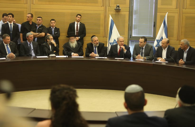 Prime Minister Benjamin Netanyahu at the right-wing bloc faction meeting at the Knesset (photo credit: MARC ISRAEL SELLEM/THE JERUSALEM POST)