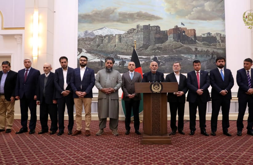 Afghanistan's President Ashraf Ghani speaks about the release of two senior Taliban commanders and a leader of the Haqqani militant group in exchange for an American and an Australian professor who were kidnapped in 2016, in Kabul, Afghanistan November 12, 2019 (photo credit: AFGHAN PRESIDENTIAL PALACE /HANDOUT VIA REUTERS)
