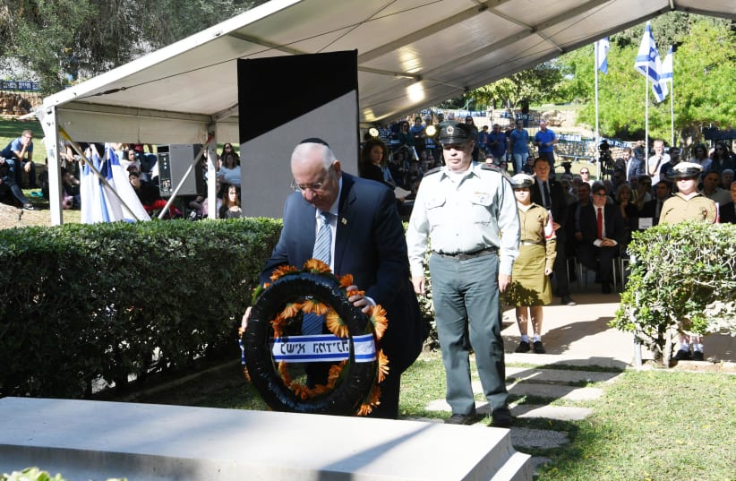 President Reuven Rivlin lays a wreath at the official memorial ceremony for Dr. Chaim Weizmann, November 19, 2019 (photo credit: AMOS BEN GERSHOM, GPO)