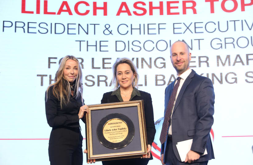 Lilach Asher Topilsky, president and CFO of the Discount Group, is given an award at The Jerusalem Post Diplomatic Conference. (photo credit: MARC ISRAEL SELLEM/THE JERUSALEM POST)
