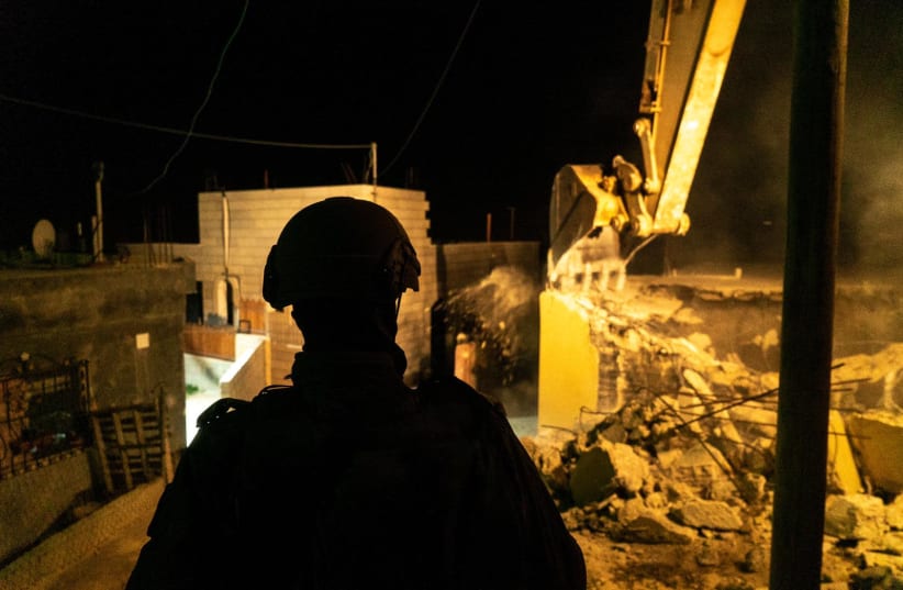 IDF soldiers demolish the houses of the terrorists who killed 18-year-old Dvir Sorek. Nov. 28, 2019 (photo credit: IDF SPOKESMAN’S UNIT)