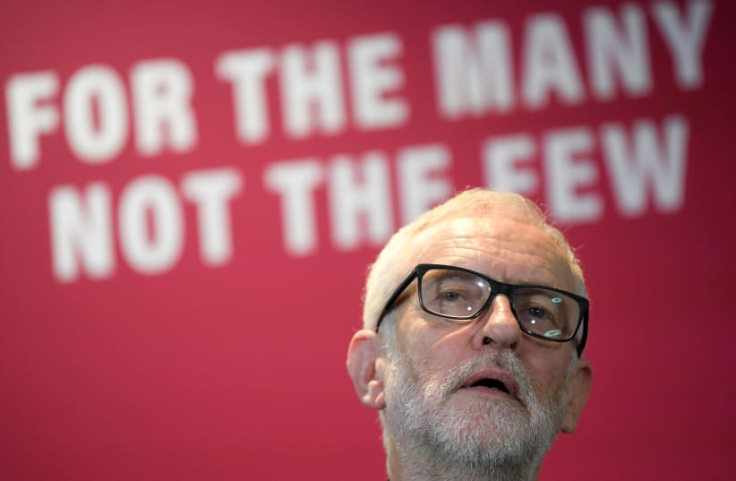 Britain's opposition Labour Party leader Jeremy Corbyn reacts as he speaks about Labour's environment policies in Southampton, Britain November 28, 2019 (photo credit: REUTERS/TOBY MELVILLE)