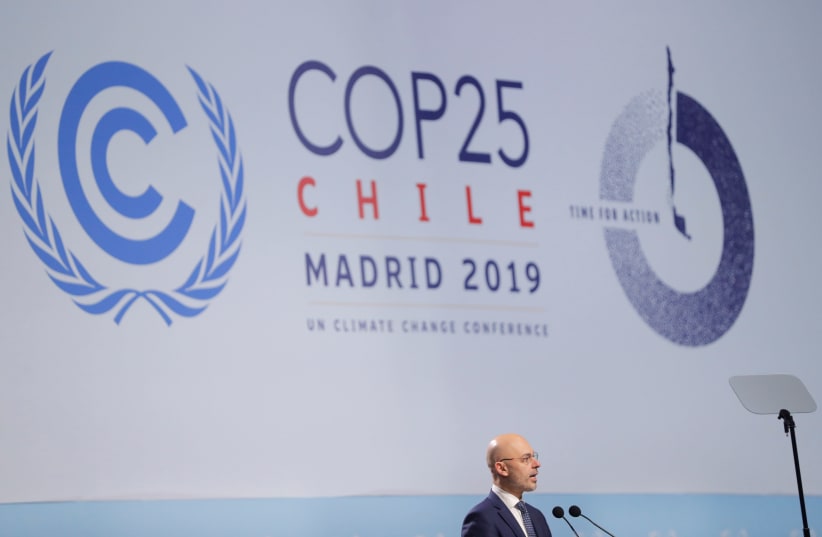 Michal Kurtyka, Poland's Climate Minister and COP24 president, speaks at the opening ceremony of the 2019 U.N. climate change conference (COP25) in Madrid, Spain, December 2, 2019 (photo credit: REUTERS/SUSANA VERA)