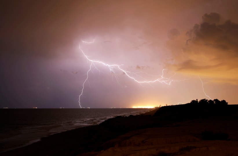 Lightning strikes over the Mediterranean sea during a rain storm near the city of Ashkelon (photo credit: AMIR COHEN/REUTERS)