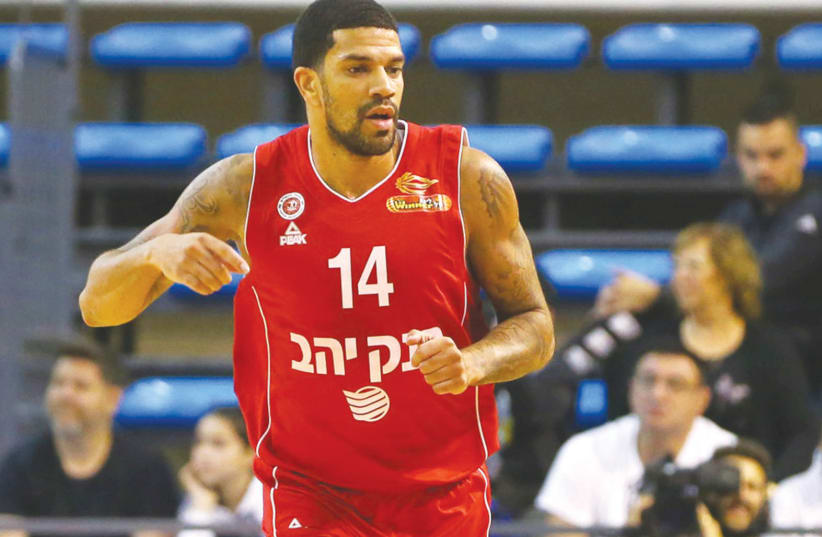 HAPOEL JERUSALEM forward James Feldeine scored a game-high 18 points to power the Reds to an 84-69 road rout of Maccabi Ashdod in local league action this week. (Liron Moldovan) (photo credit: LIRON MOLDOVAN/BSL)