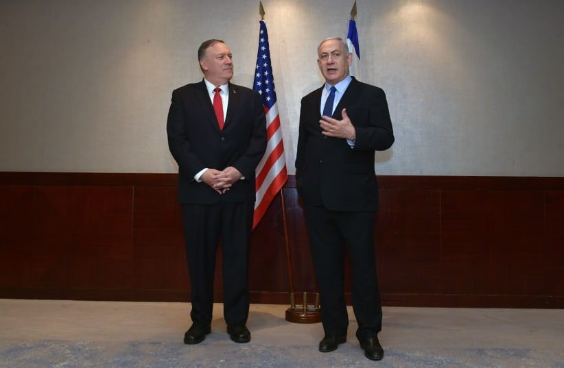 US Secretary of State Mike Pompeo and Prime Minister Benjamin Netanyahu meet in Lisbon, December 4, 2019 (photo credit: KOBI GIDEON/GPO)