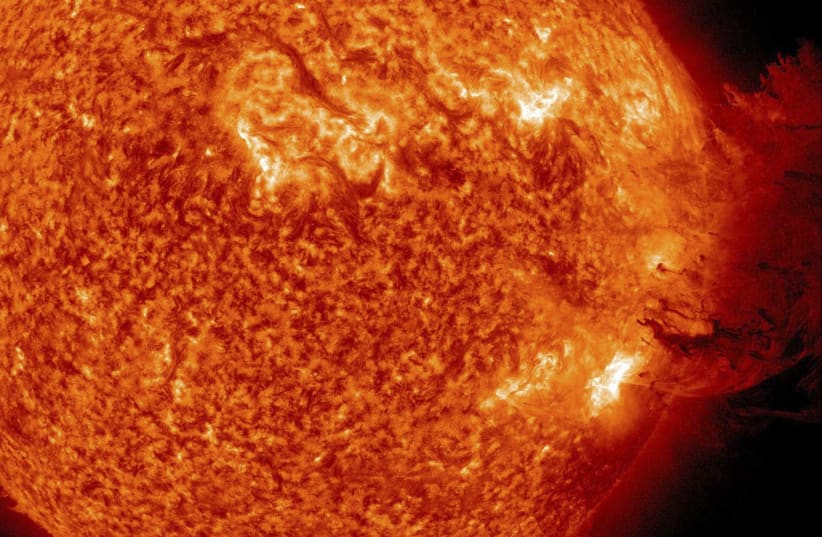 A handout picture shows Coronal Mass Ejection as viewed by the Solar Dynamics Observatory (photo credit: REUTERS/NASA/SDO/HANDOUT)