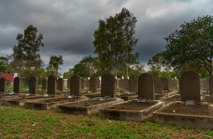 The graves in Saint Martin Jewish Cemetery in Mauritius tell a Holocaust story that few people know (photo credit: AMIR LESHEM)
