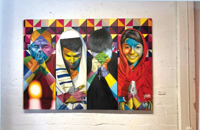 A MURAL by Brazilian street artist Eduardo Kobra shows four individuals representing four great religions in a painting titled ‘Coexist' (photo credit: BEN G. FRANK)