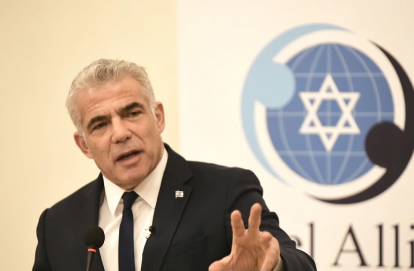 Blue and White No.2, Yair Lapid, speaks at the Israel Allies Foundation conference, December 9, 2019 (photo credit: AVI HAYUN)