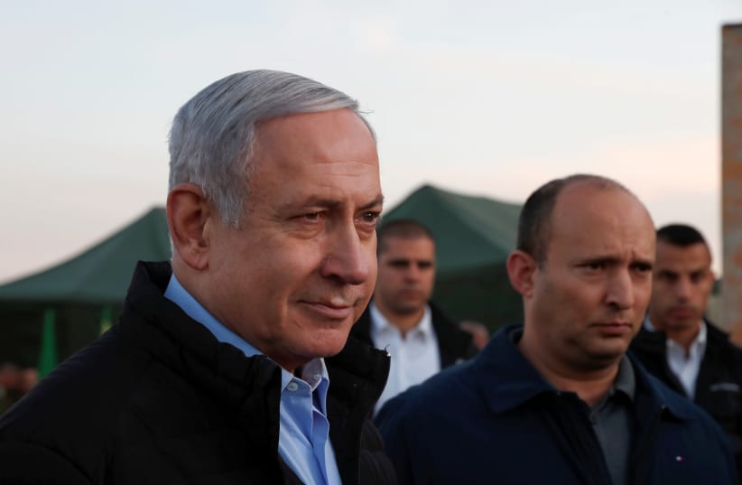 Prime Minister Benjamin Netanyahu and Defense Minister Naftali Bennett visit an army base on the Golan Heights on November 24 (photo credit: REUTERS)