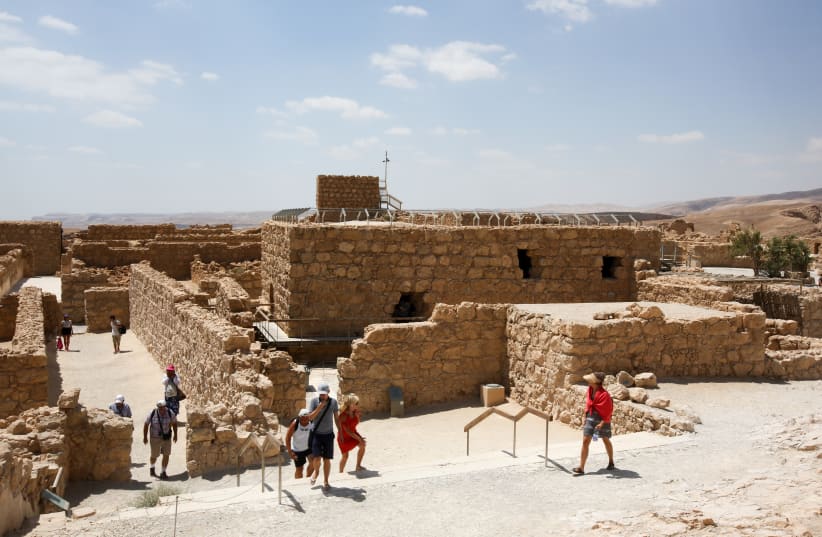 Tourists visit the ancient fortress of Masada (photo credit: MARC ISRAEL SELLEM)
