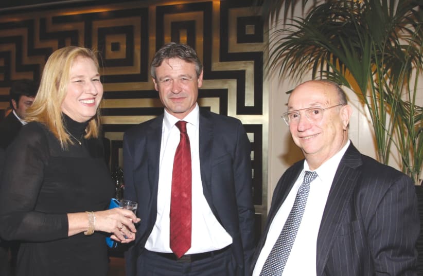 FROM LEFT: Tzipi Livni, Swiss Ambassador Jean-Daniel Ruch and Gideon Hamburger. (photo credit: DROR EITAN)