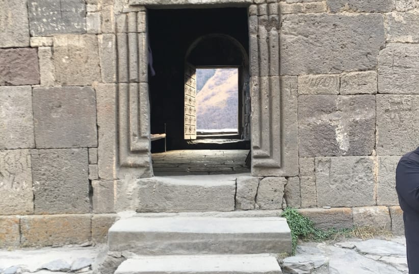 A PEEKABOO view from the Gergeti Trinity Church, at an elevation of 2,170 meters. (photo credit: ERICA SCHACHNE)