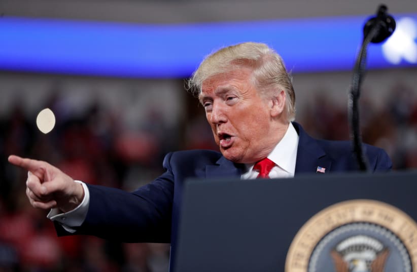 U.S. President Donald Trump delivers remarks during a campaign rally at the Giant Center in Hershey, Pennsylvania, U.S., December 10, 2019 (photo credit: REUTERS//TOM BRENNER)