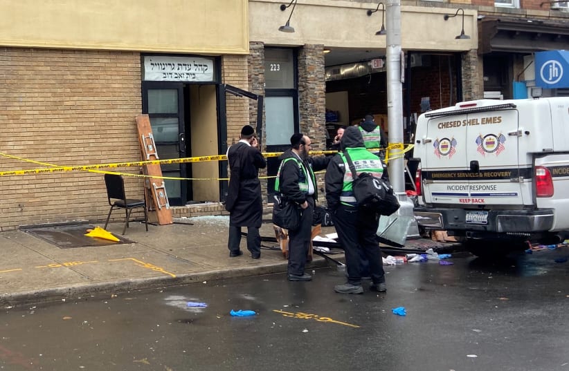 A picture of the scene the day after an hours-long gun battle with two men around a kosher market in Jersey City, NJ, Dec. 11, 2019 (photo credit: REUTERS/LLOYD MITCHELL)