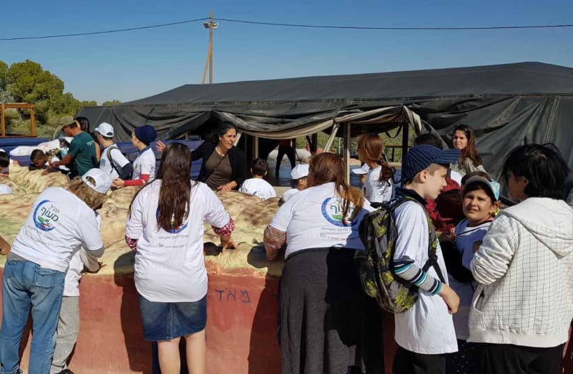 40 students from Sderot with special needs at KKL-JNF Field and Forest Center in Yatir Forest for a day of respite after days of escalation in the south (photo credit: KKL-JNF)