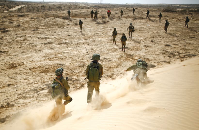 SOLDIERS take part in a drill. Are environmental issues taken into consideration? (photo credit: AMIR COHEN/REUTERS)