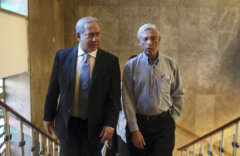 Israel's Prime Minister Benjamin Netanyahu (L) and Benny Begin, the son of the late Prime Minister Menahem Begin and a member of Netanyahu's cabinet, arrive to the weekly cabinet meeting in Jerusalem October 31, 2010 (photo credit: REUTERS/JIM HOLLANDER/POOL)