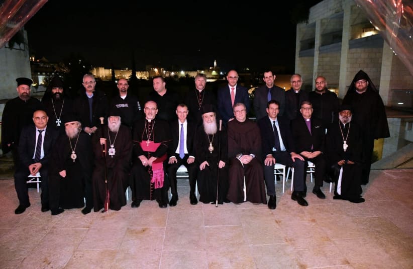 Clergymen meet with Tourism Minister Yariv Levin at the Holy Sepulchre Church (photo credit: SHLOMI AMSALEM)