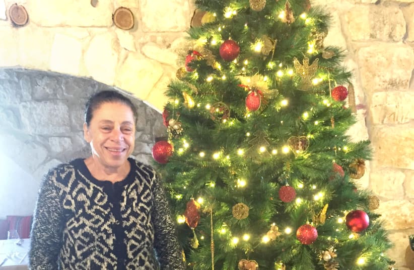 CHRISTMAS TREE, my Christmas tree: Salma Assaf in her restaurant, Chateau de Roi (photo credit: DIANA BLETTER)
