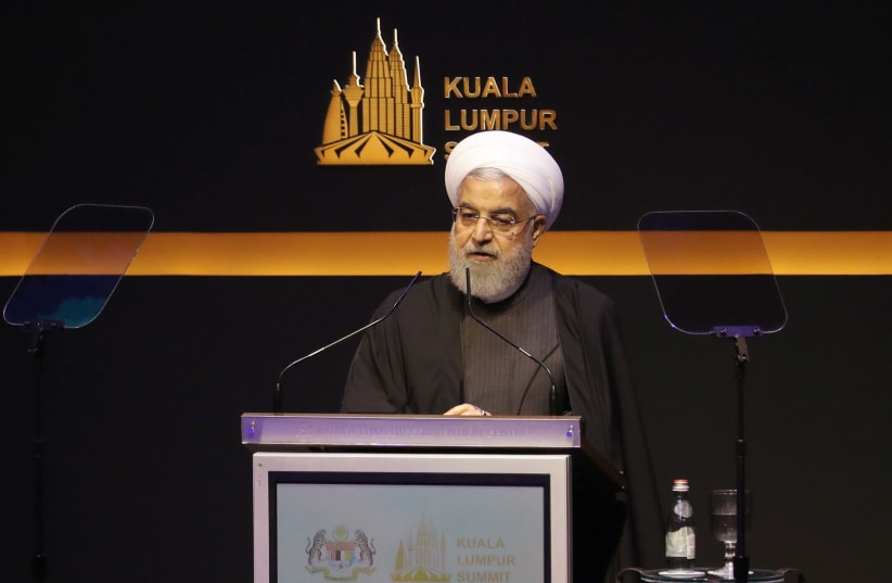 Iranian President Hassan Rouhani speaks during Kuala Lumpur Summit in Malaysia (photo credit: REUTERS/LIM HUEY TENG)