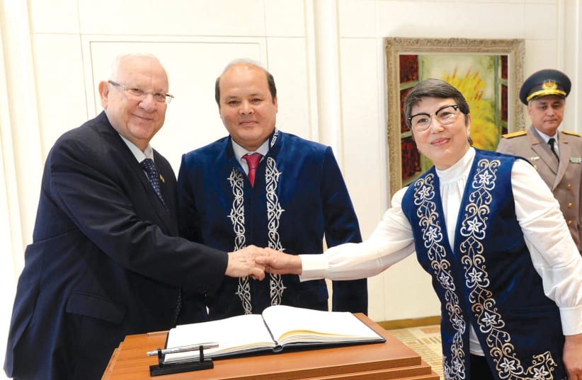 President Reuven Rivlin greets Ambassador of Kazakhstan Satybaldy Burshakiv and his wife. (photo credit: Mark Neiman/GPO)