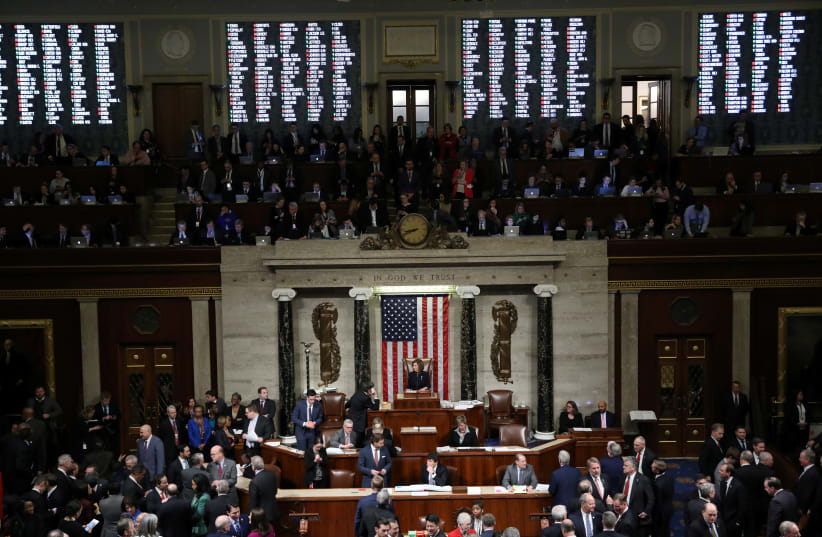 U.S. House of Representatives votes on Trump impeachment on Capitol Hill in Washington on December 19, 2019. (photo credit: REUTERS/JONATHAN ERNST)