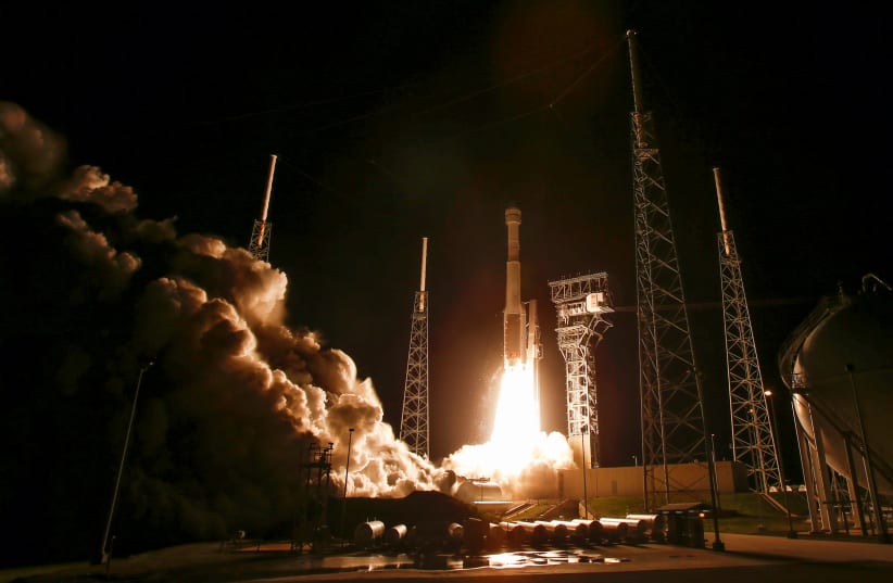 The Boeing CST-100 Starliner spacecraft, atop a ULA Atlas V rocket, lifts off for an uncrewed Orbital Flight Test to the International Space Station from launch complex 40 at the Cape Canaveral Air Force Station in Cape Canaveral, Florida December 20, 2019 (photo credit: REUTERS/JOE SKIPPER)