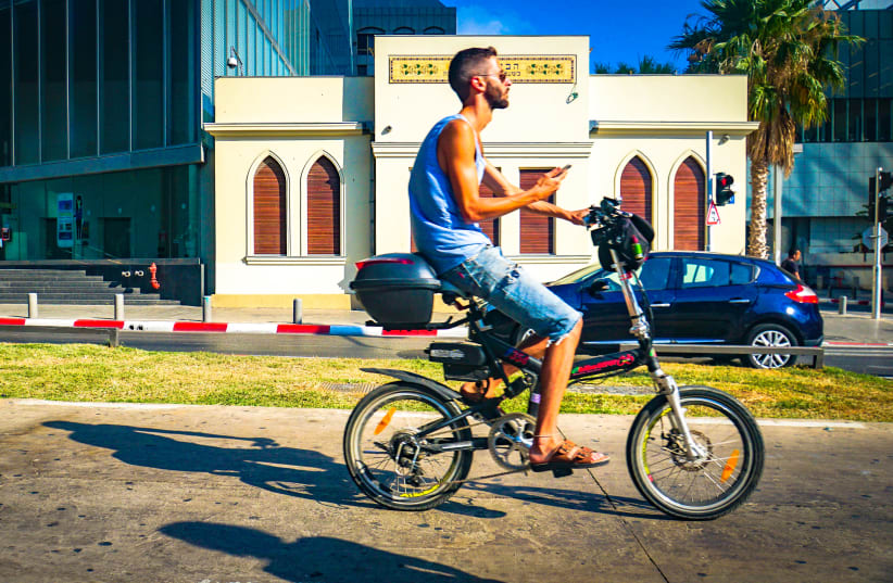 Electric bicycles are a newish phenomenon in Israel, with some controversy around increasing fatalities and accidents, and competition with the bikesharing network. (photo credit: TED EYTAN)