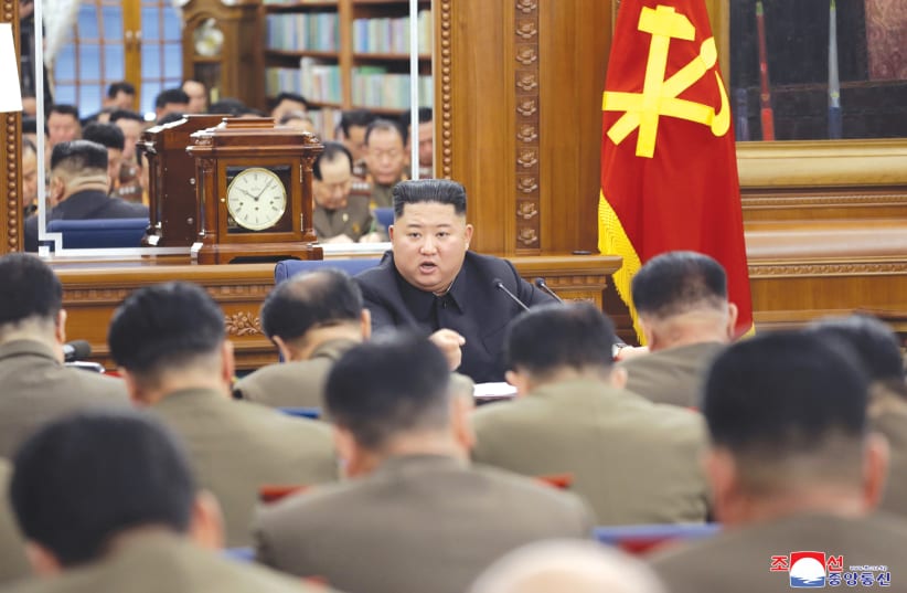 NORTH KOREAN LEADER Kim Jong Un addresses the Third Enlarged Meeting of the Seventh Central Military Commission of the Workers’ Party. (photo credit: REUTERS/KCNA)