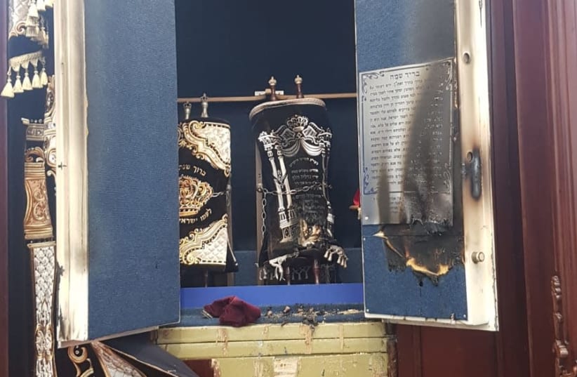 Torah scrolls were damaged in the attack on the synagogue in Modi'in Ilit, December 23, 2019 (photo credit: POLICE SPOKESPERSON'S UNIT)