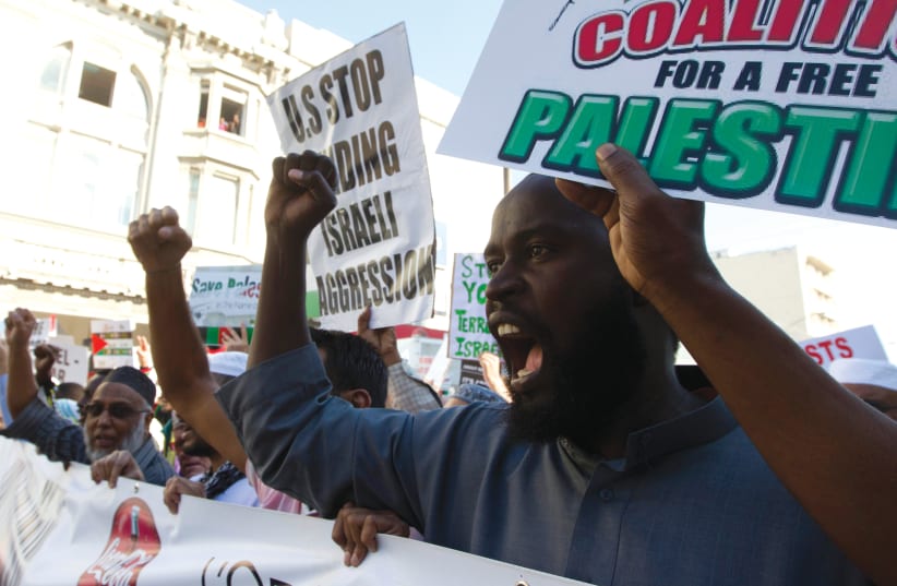 ANTI-ISRAEL Protesters emerge after Friday Islamic prayers in Durban, South Africa in 2014     (photo credit: REUTERS)